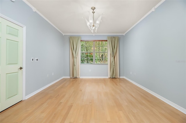 8231 SW 79th Ct, Ocala, FL 34476 - unfurnished room with a chandelier, light wood-type flooring, ornamental molding, and baseboards