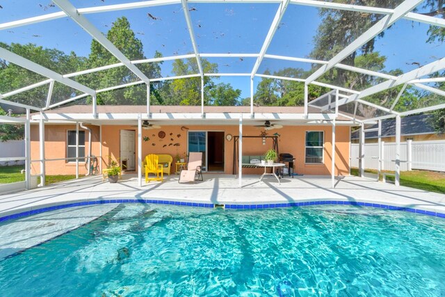 view of pool featuring ceiling fan, a fenced in pool, and a patio area