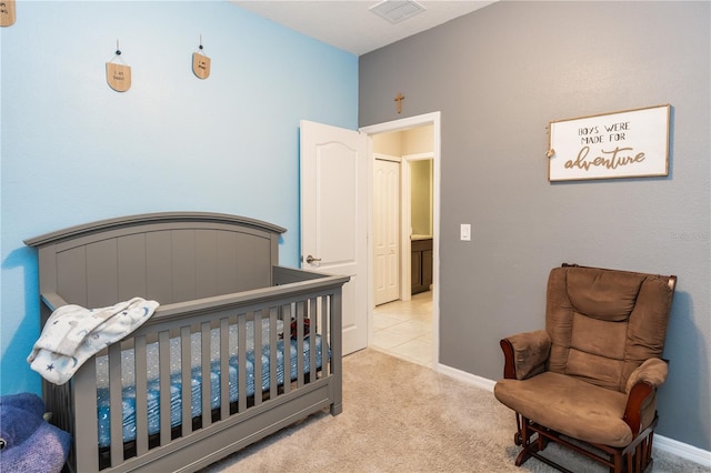 bedroom with carpet flooring, baseboards, and visible vents