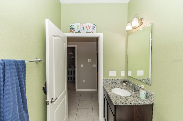 bathroom featuring tile patterned floors and vanity