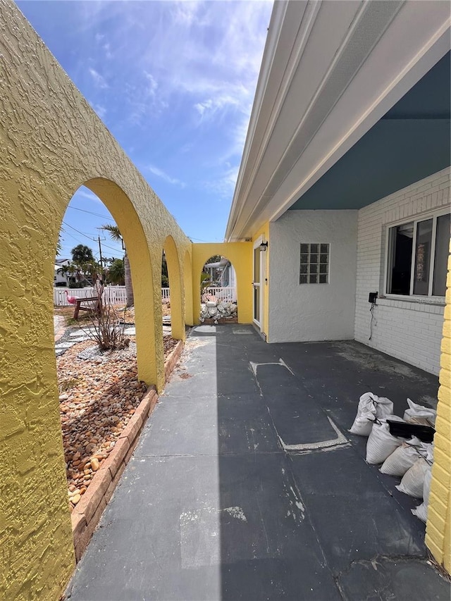 855 Boca Ciega Isle Dr, St Pete Beach, FL 33706 - view of patio featuring fence