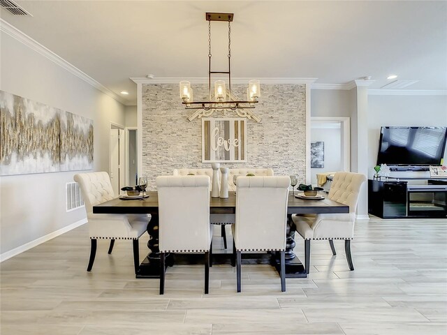 260 Teddy Rushing St, Debary, FL 32713 - dining room featuring visible vents, ornamental molding, an inviting chandelier, and light wood finished floors