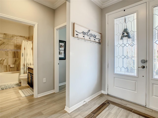 260 Teddy Rushing St, Debary, FL 32713 - foyer entrance with light wood-style floors, ornamental molding, and baseboards