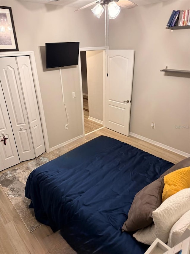 260 Teddy Rushing St, Debary, FL 32713 - bedroom with a closet, baseboards, a ceiling fan, and wood finished floors