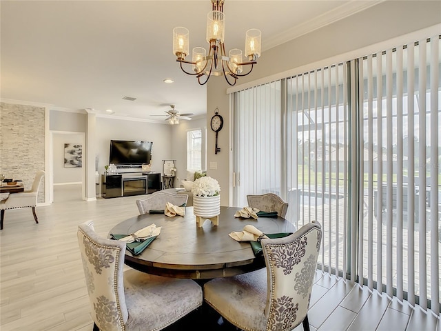 260 Teddy Rushing St, Debary, FL 32713 - dining area featuring crown molding, recessed lighting, ceiling fan with notable chandelier, and light wood finished floors