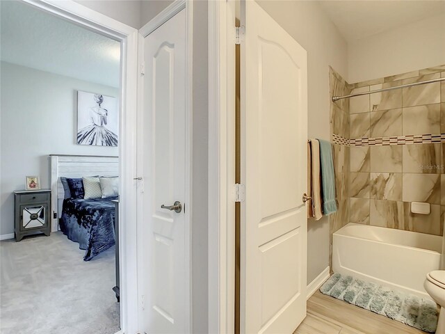 260 Teddy Rushing St, Debary, FL 32713 - bathroom featuring baseboards and shower / bathing tub combination