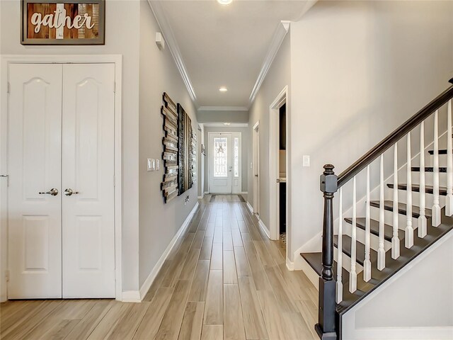 260 Teddy Rushing St, Debary, FL 32713 - entrance foyer with stairs, baseboards, light wood finished floors, ornamental molding, and recessed lighting