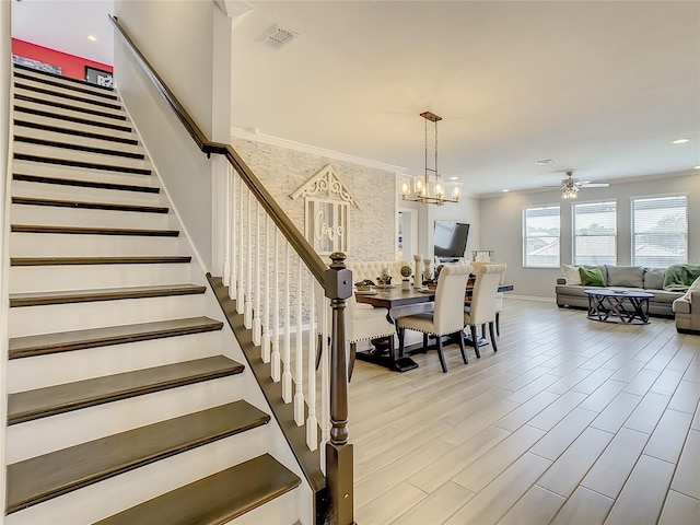 260 Teddy Rushing St, Debary, FL 32713 - staircase with ceiling fan with notable chandelier, recessed lighting, baseboards, wood finished floors, and visible vents