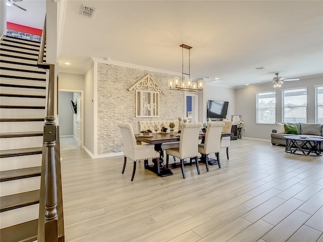 260 Teddy Rushing St, Debary, FL 32713 - dining area with visible vents, stairs, baseboards, light wood finished floors, and ceiling fan with notable chandelier