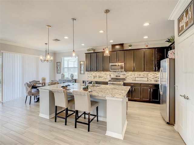 260 Teddy Rushing St, Debary, FL 32713 - kitchen with ornamental molding, decorative backsplash, dark brown cabinets, a breakfast bar area, and appliances with stainless steel finishes