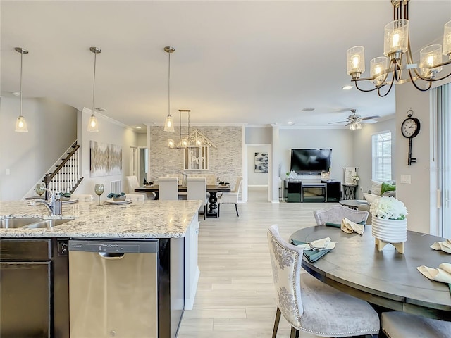 260 Teddy Rushing St, Debary, FL 32713 - kitchen featuring crown molding, open floor plan, a sink, ceiling fan with notable chandelier, and dishwasher