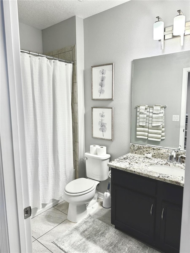 260 Teddy Rushing St, Debary, FL 32713 - full bathroom with tile patterned flooring, vanity, toilet, a textured ceiling, and curtained shower