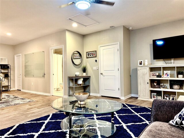 260 Teddy Rushing St, Debary, FL 32713 - living area featuring baseboards, attic access, recessed lighting, and wood finished floors
