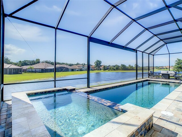 260 Teddy Rushing St, Debary, FL 32713 - view of swimming pool featuring a patio, a pool with connected hot tub, a lanai, and a water view
