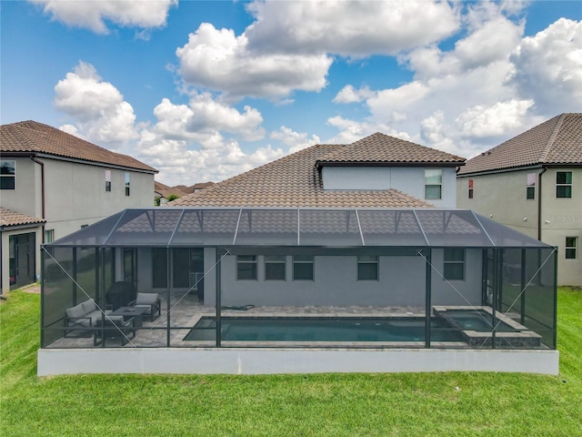 260 Teddy Rushing St, Debary, FL 32713 - rear view of house with a patio, glass enclosure, an outdoor pool, and a tile roof