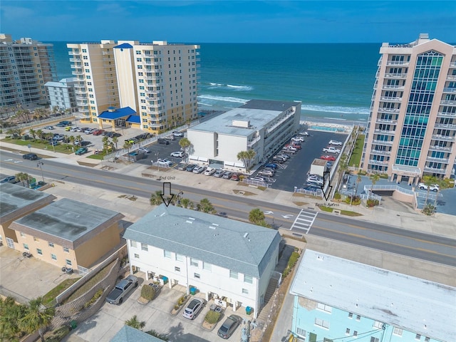 aerial view featuring a water view and a city view
