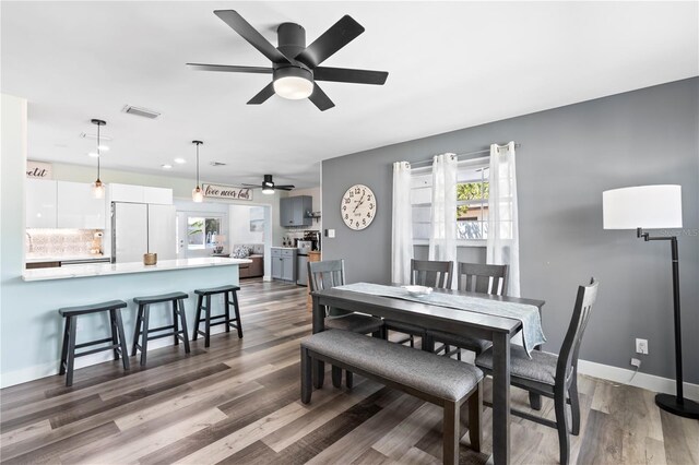 2824 Oak Lea Dr, South Daytona, FL 32119 - dining room with ceiling fan, dark wood finished floors, recessed lighting, baseboards, and visible vents