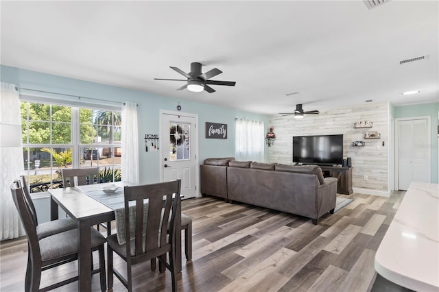 2824 Oak Lea Dr, South Daytona, FL 32119 - dining room with visible vents, light wood-style flooring, and ceiling fan