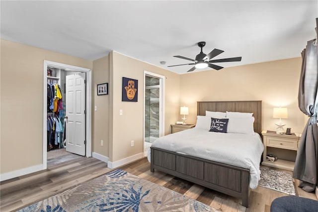 2824 Oak Lea Dr, South Daytona, FL 32119 - bedroom with a ceiling fan, baseboards, wood finished floors, and a closet