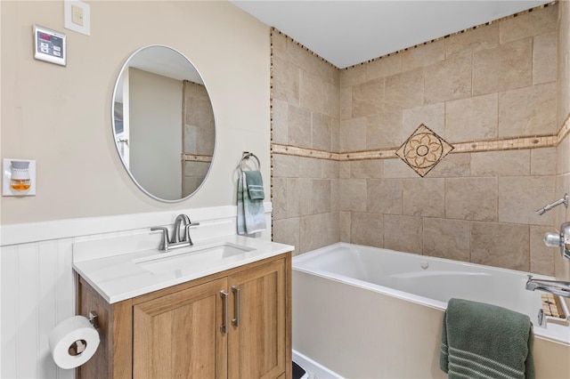 2824 Oak Lea Dr, South Daytona, FL 32119 - bathroom featuring vanity and wainscoting