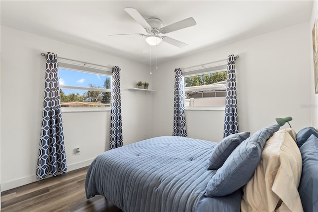 2824 Oak Lea Dr, South Daytona, FL 32119 - bedroom with baseboards, ceiling fan, and wood finished floors