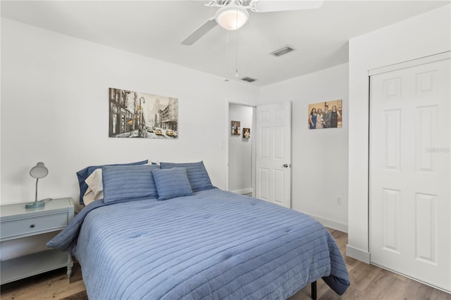 2824 Oak Lea Dr, South Daytona, FL 32119 - bedroom with visible vents, a ceiling fan, light wood-style flooring, and baseboards