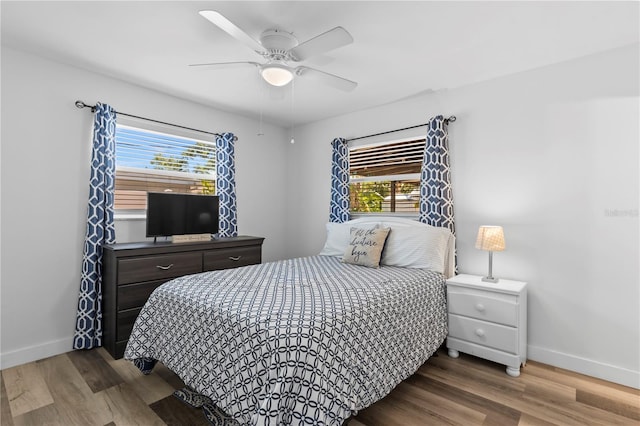 2824 Oak Lea Dr, South Daytona, FL 32119 - bedroom featuring baseboards, ceiling fan, and wood finished floors