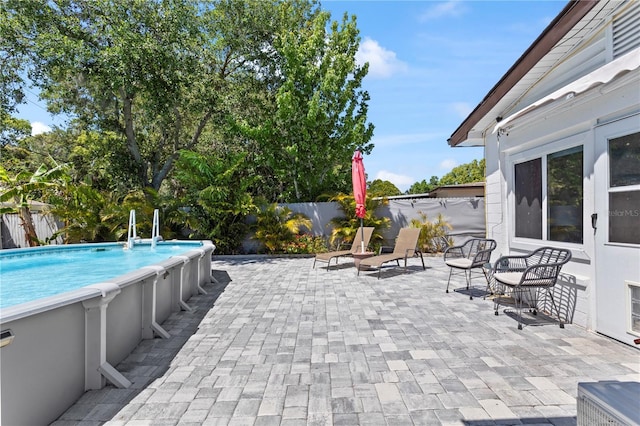 2824 Oak Lea Dr, South Daytona, FL 32119 - view of patio with fence and a fenced in pool
