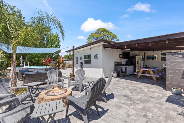 2824 Oak Lea Dr, South Daytona, FL 32119 - view of patio / terrace featuring a fire pit and an outdoor pool