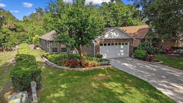30 Reflections Village Dr, Ormond Beach, FL 32174 - view of front of property with brick siding, a front lawn, an attached garage, and concrete driveway