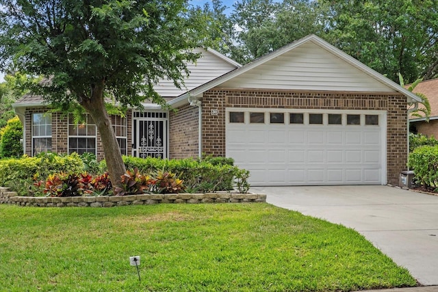 30 Reflections Village Dr, Ormond Beach, FL 32174 - view of front facade with brick siding, driveway, a front yard, and a garage