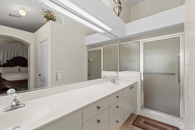 30 Reflections Village Dr, Ormond Beach, FL 32174 - ensuite bathroom featuring a sink, a stall shower, and double vanity