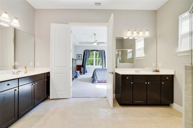 bathroom with ceiling fan, visible vents, a shower stall, and tile patterned flooring