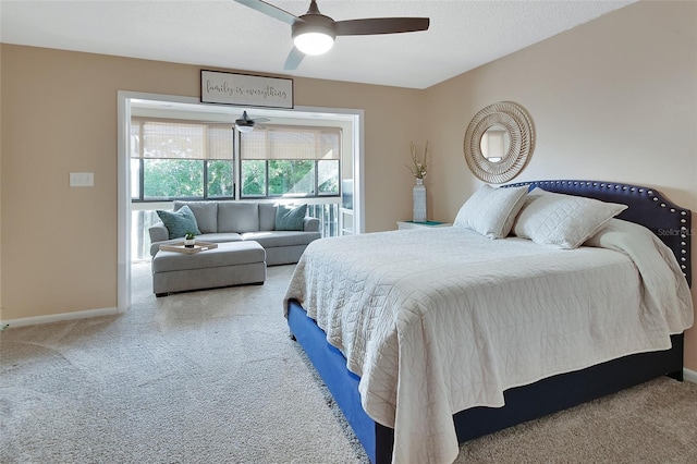 bedroom with ceiling fan, carpet floors, and baseboards
