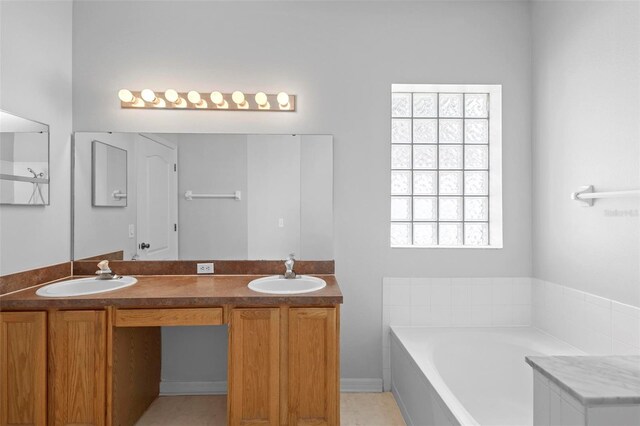 15733 Green Point Ct, Clermont, FL 34714 - full bath with a wealth of natural light, a bath, and a sink