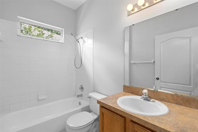 15733 Green Point Ct, Clermont, FL 34714 - bathroom featuring vanity, toilet, and shower / bathing tub combination