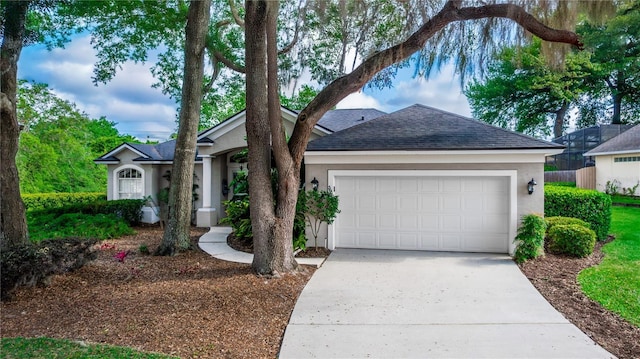 single story home featuring a garage, a shingled roof, stucco siding, and driveway