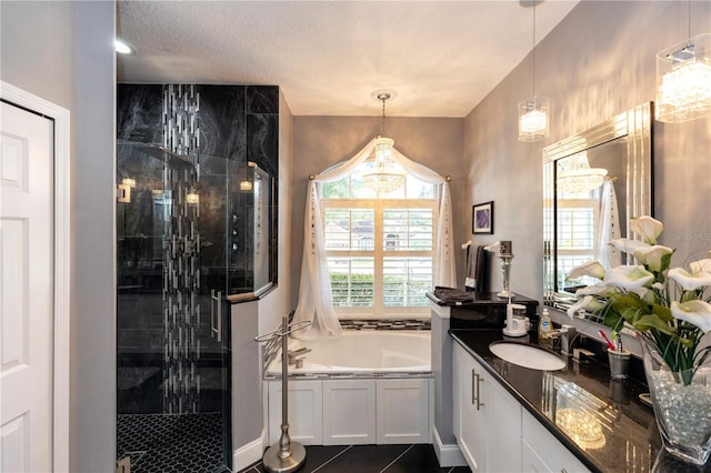 full bathroom with vanity, tile patterned flooring, a garden tub, and a stall shower