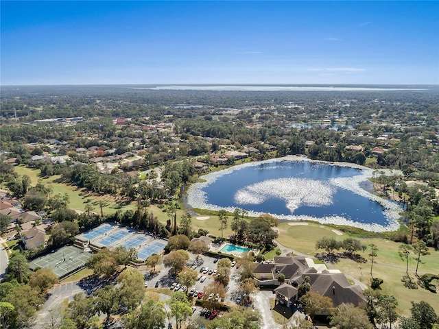aerial view featuring a water view and golf course view