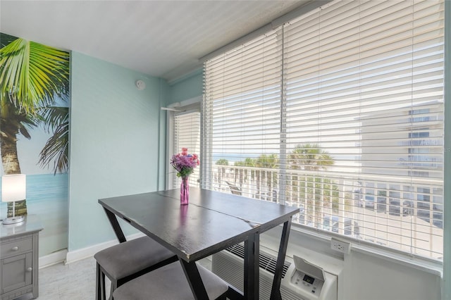 dining room featuring baseboards
