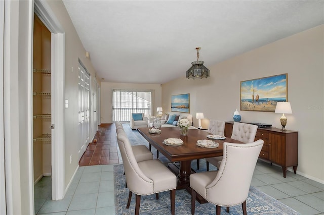 313 Dirksen Dr Unit B15, Debary, FL 32713 - dining area featuring light tile patterned flooring and baseboards