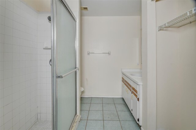 313 Dirksen Dr Unit B15, Debary, FL 32713 - full bathroom featuring tile patterned floors, a shower stall, vanity, and toilet