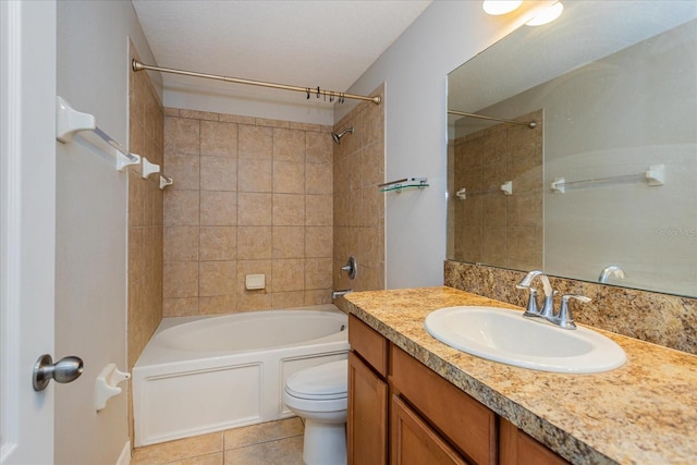 full bath with toilet, tile patterned floors, shower / washtub combination, and vanity