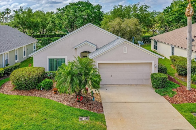 276 Gala Cir, Daytona Beach, FL 32124 - view of front of property with stucco siding, an attached garage, driveway, and a front yard