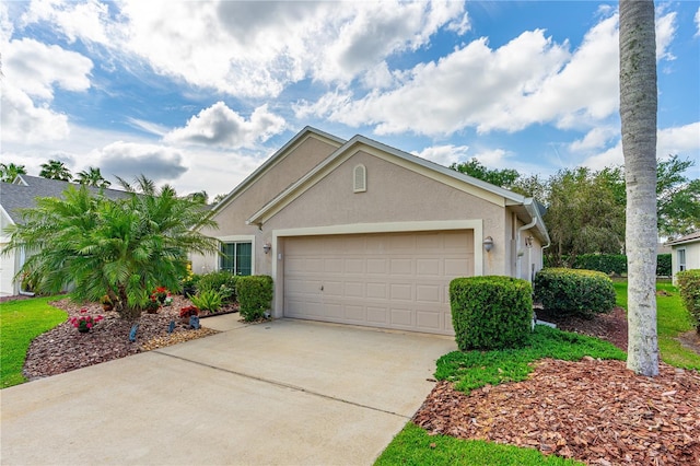 276 Gala Cir, Daytona Beach, FL 32124 - ranch-style home featuring an attached garage, stucco siding, and concrete driveway