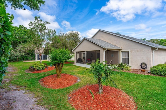 276 Gala Cir, Daytona Beach, FL 32124 - view of front of house with stucco siding, a sunroom, and a front yard