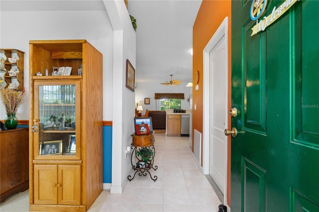 276 Gala Cir, Daytona Beach, FL 32124 - foyer entrance featuring light tile patterned floors, a ceiling fan, and baseboards