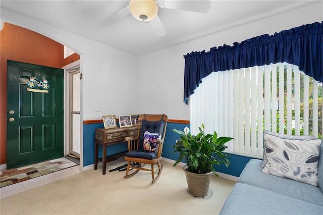 276 Gala Cir, Daytona Beach, FL 32124 - living area featuring plenty of natural light, baseboards, and arched walkways