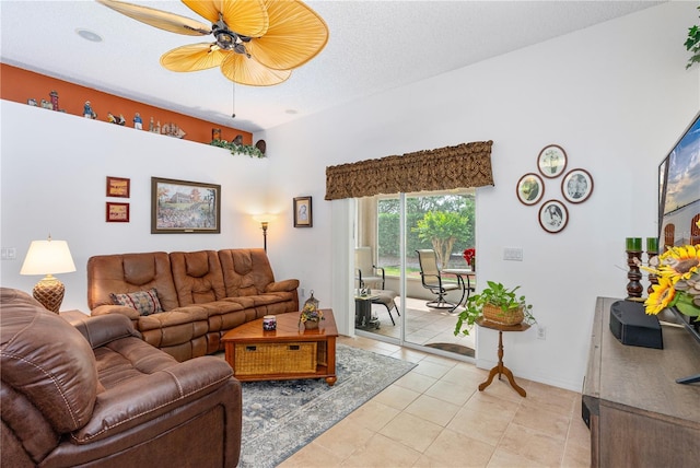 276 Gala Cir, Daytona Beach, FL 32124 - living room with a ceiling fan, light tile patterned floors, and a textured ceiling