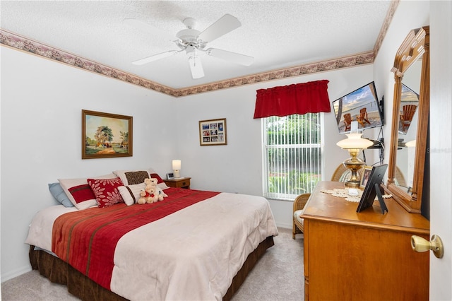 276 Gala Cir, Daytona Beach, FL 32124 - bedroom with light colored carpet, a textured ceiling, baseboards, and a ceiling fan